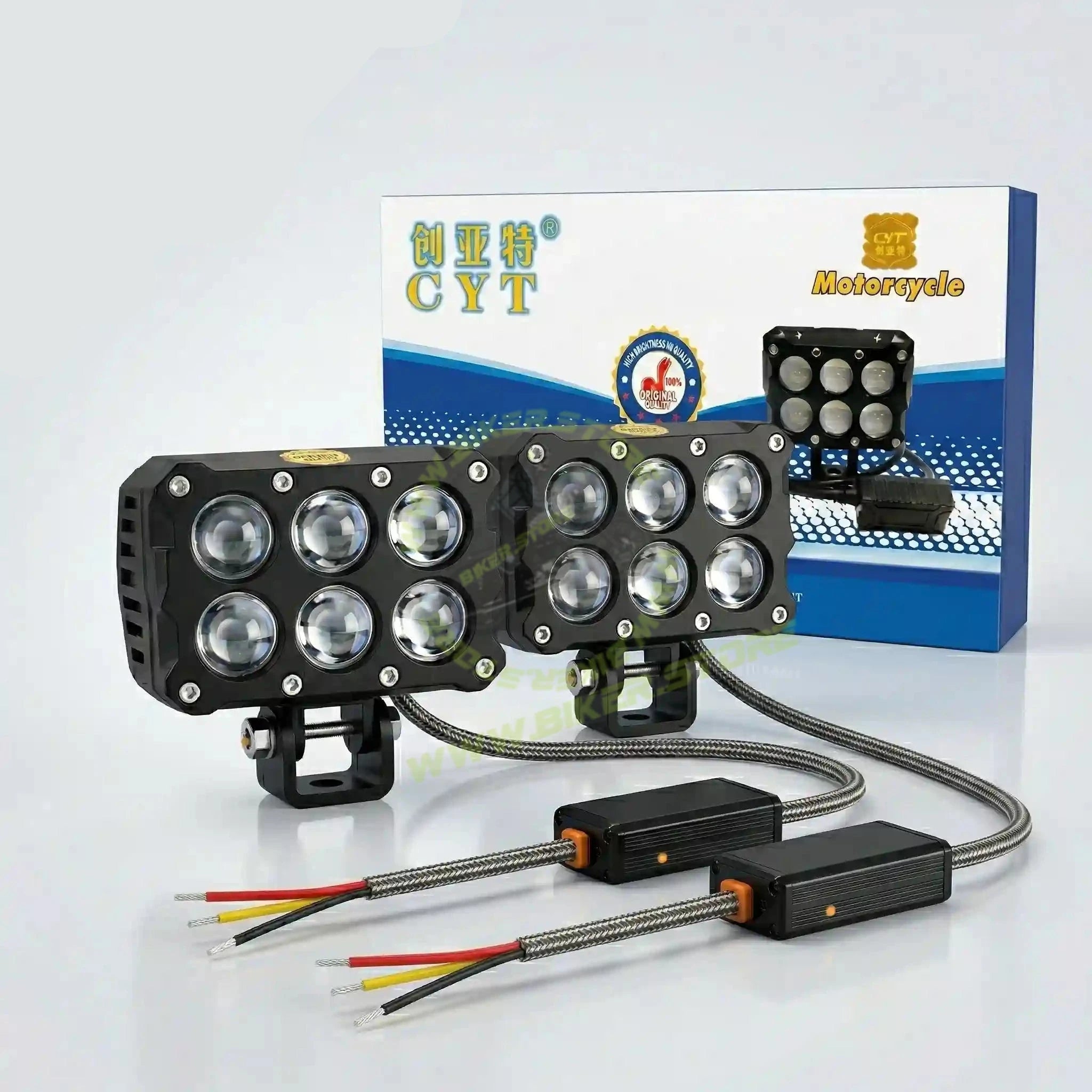 Motorcycle lights with wiring harness and CYT branded box on a white background