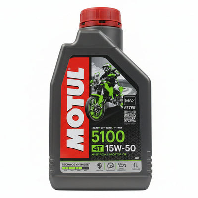 Motul 5100 4T motor oil bottle on a reflective surface